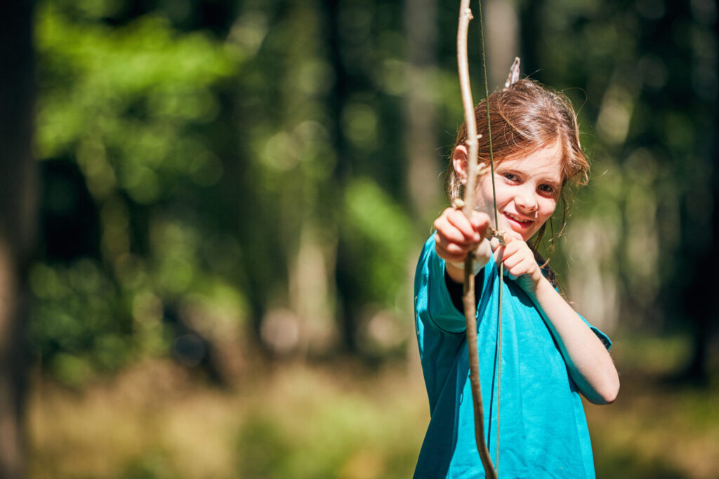 Girl archery Bushcraft Badminton 